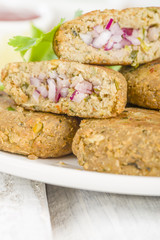 Shami Kebab - Minced meat patties filled with red onion pickle