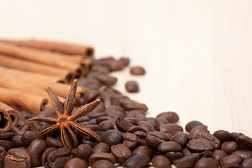 coffee beans on wooden surface background