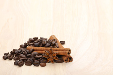 coffee beans on wooden surface background