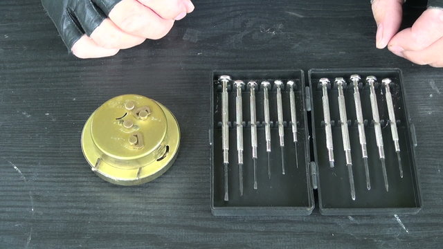 clockmaker repairing old clock. Clock repair