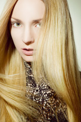Beautiful girl with golden hair