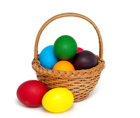 Easter eggs in basket over white