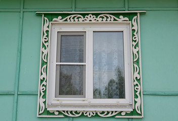 Window with carved platbands