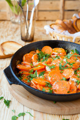 carrots baked with cream in a pan