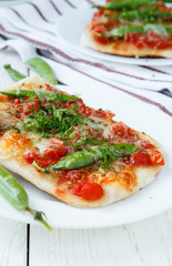 pita with green peas and tomatoes