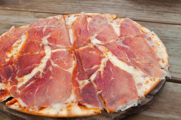 pizza with ham and cheese.