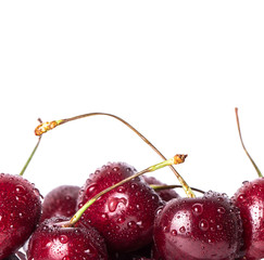 Close up of fresh cherry berries isolated on white.