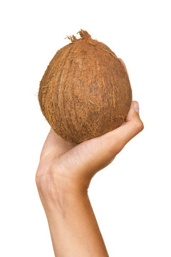 Hand with a coconut