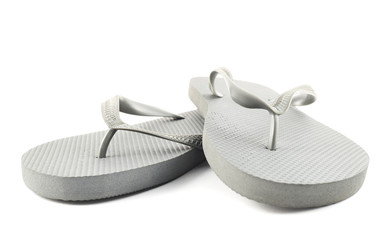 Grey rubber flip-flops isolated