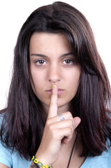 teen girl making a quiet gesture