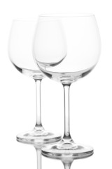Empty wine glasses arranged and isolated on white