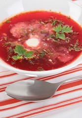 Delicious borsch on table close-up