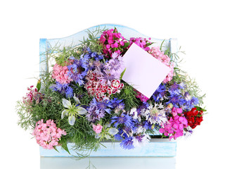 Beautiful bouquet in basket isolated on white