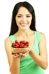 Girl with fresh cherries isolated on white