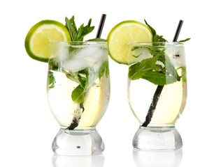 Glasses of cocktail with ice isolated on white
