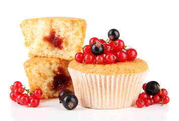 Tasty muffins with berries isolated on white