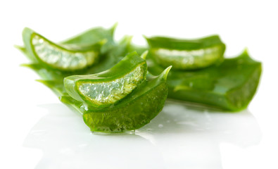 Aloe leaves with drops, isolated on white