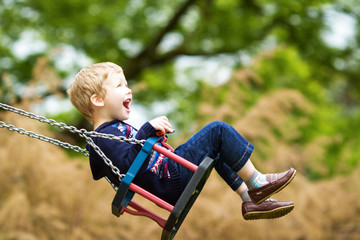 Little child on swing
