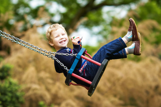 Little child on swing