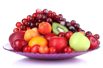 Assortment of juicy fruits isolated on white