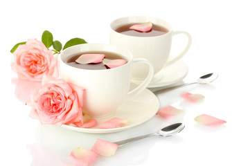 cups of tea with rose isolated on white