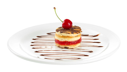 Tasty biscuit cake with chocolate and berry