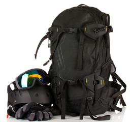 Winter sport glasses, helmet and gloves, backpack, isolated