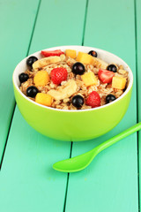 Oatmeal with fruits on table close-up