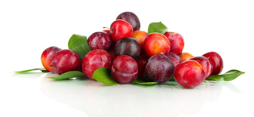 Ripe plums isolated on white