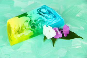 Piece of handmade soap, on bright background