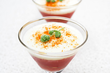 bilayer tomato panna cotta with smoked pepper and yogurt closeup
