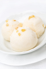 Ginger ice cream with melted milk, close-up