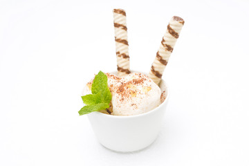 ice cream with ginger and chocolate, decorated with waffles