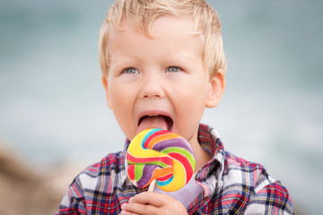 Little boy with lollipop