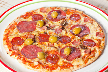 Bacon and pepperoni pizza