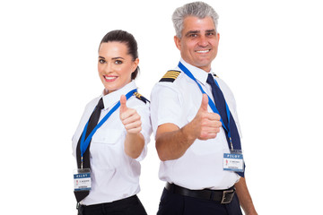 airline pilots giving thumbs up