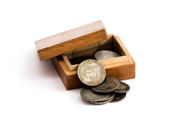 Old hungarian silver coins in a wooden box
