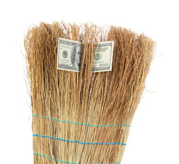 Broom sweep the dollars close-up