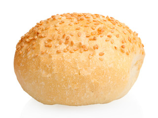 delicious bun with sesame seeds isolated on white