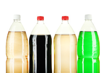 Assortment of bottles with tasty drinks, isolated on white