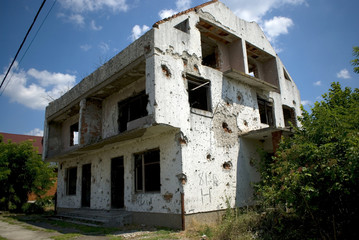 House with bullet tracks, Laslovo, Croatia
