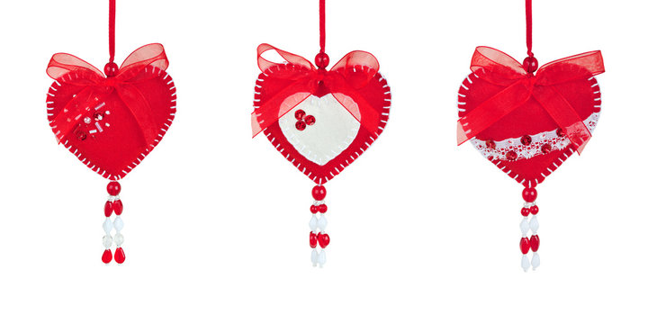 Collage of three hanging red handmade hearts