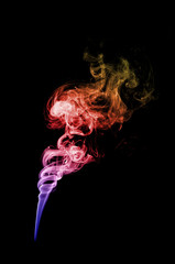 colored smoke in black background