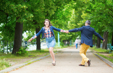 Obraz premium Couple having fun in a park