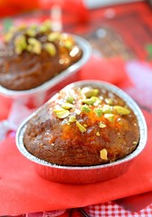 Heart-shaped muffins decorated with pistachios