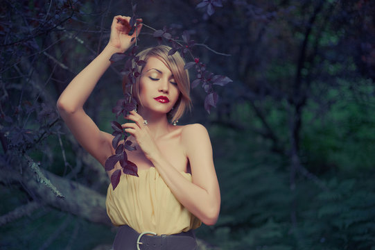 Beautiful lady in fairy forest
