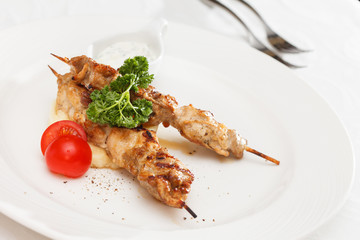 Skewered meat with vegetables