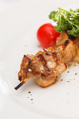 Skewered meat with vegetables