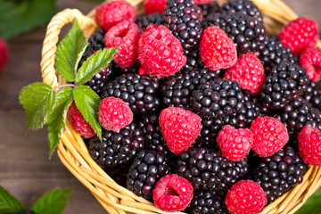 Raspberry and blackberry in the basket