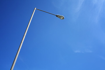 Lighting pole with blue sky